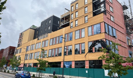 Curtain wall installation in progress at Triaden BT6