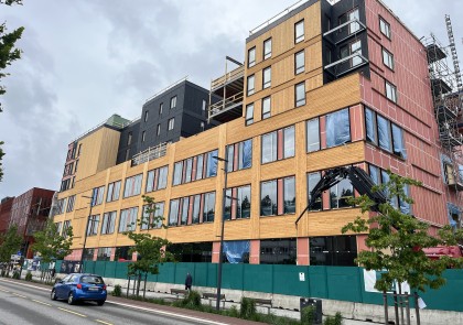 Curtain wall installation in progress at Triaden BT6